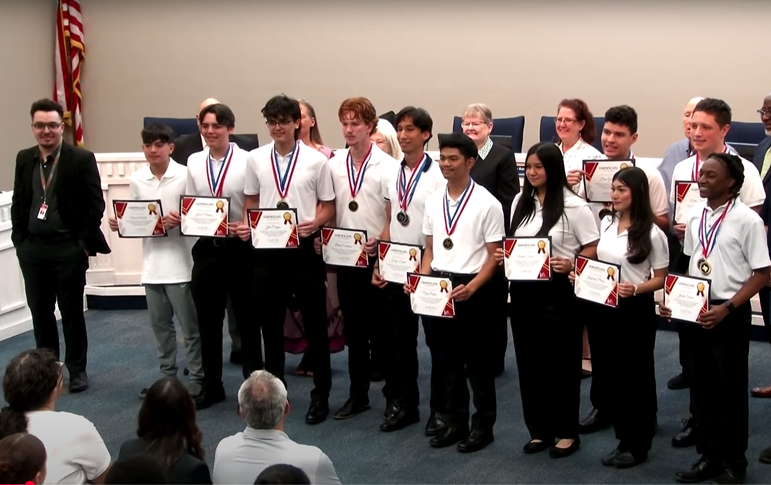 Joshua with students